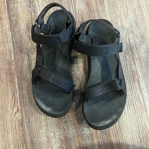 TEVA black sandals.